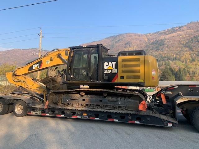 Caterpillar 330F excavator on lowbed