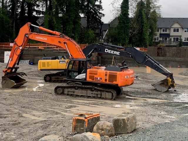 John Deere excavator on site